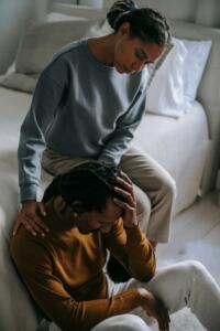 Woman-comforting-her-husband-struggling-with-infertility